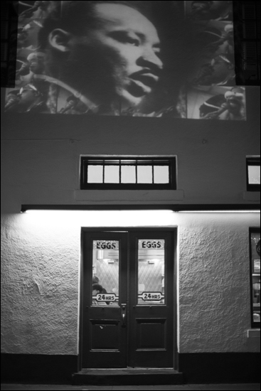 A speech by Martin Luther King, Jr., is projected on the wall of the Clover Grill in New Orleans, 2014.